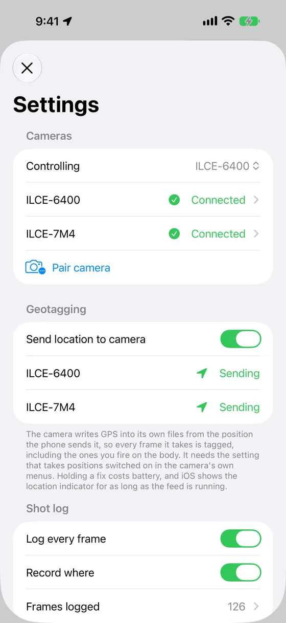 Settings on iPhone showing two cameras connected and the phone's location being sent to both.