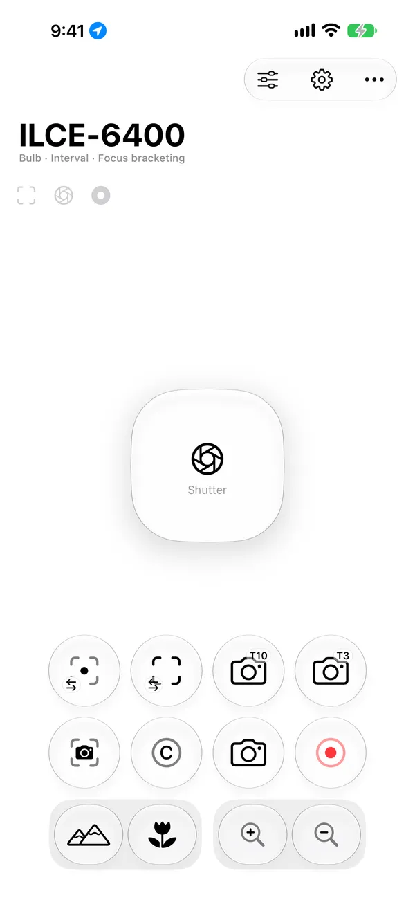 The Shutter Link remote on iPhone: the camera's name, a large shutter tile, and a grid of focus, self-timer, record, zoom and focus-drive controls.